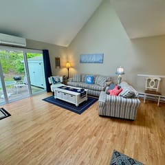 Spacious, renovated and beautifully decorated Howland Village townhouse with straight staircase