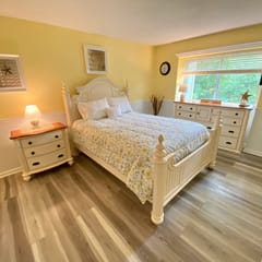 This lovely ground level Eaton Village apartment is delightfully furnished and decorated.
