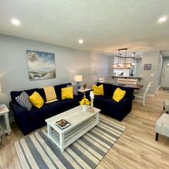 Come enjoy your stay at this light and bright 1st floor condo located in the prestigious Ocean Edge.