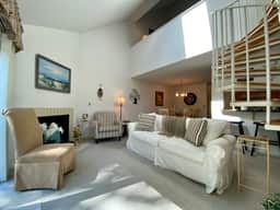 This spacious Billington Village condo features updated kitchen and 2 BRs plus a loft sleeping area. - Image 2