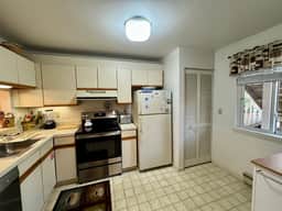 This Sunny, End Unit Apartment in Eaton Village Features a Nice Tree-lined View. - Image 4