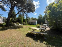 Discover your perfect getaway at this inviting, dog friendly, 4BR home minutes from the beach! - Image 3