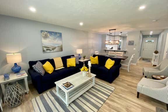 Come enjoy your stay at this light and bright 1st floor condo located in the prestigious Ocean Edge. - Image 1