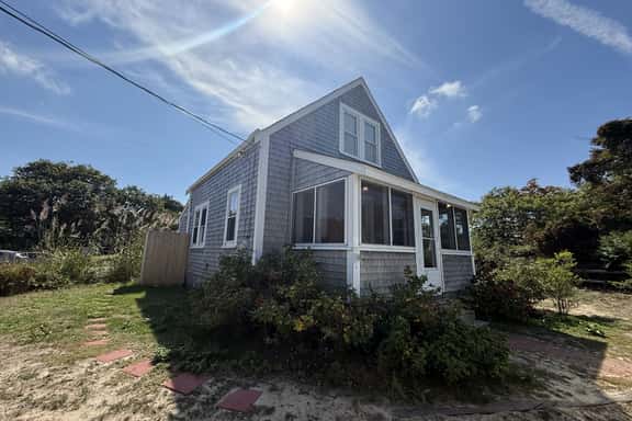 Charming Brewster beach cottage steps from the bay, sunsets, and local favorites. - Image 1