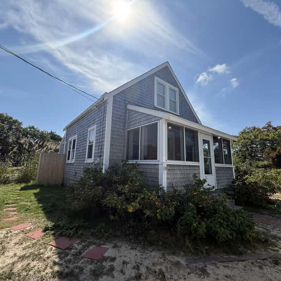 Charming Brewster beach cottage steps from the bay, sunsets, and local favorites. - Image 1