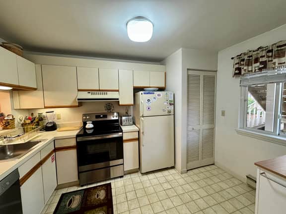 This Sunny, End Unit Apartment in Eaton Village Features a Nice Tree-lined View. - Image 4